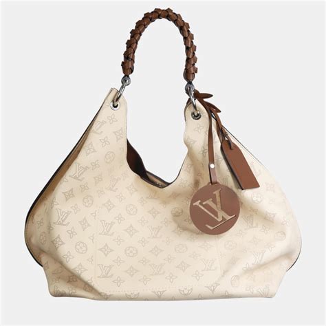 louis vuitton cream bag|louis vuitton mahina carmel bag.